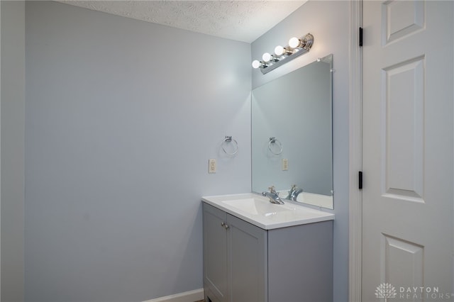 1717 Pershing Ave, Middletown, OH 45044 - bathroom with vanity and a textured ceiling