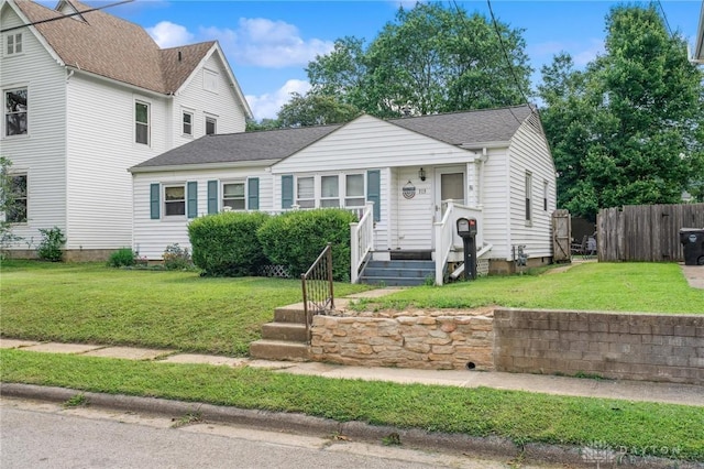 313 N High St, Wilmington, OH 45177 - view of front facade with roof with shingles