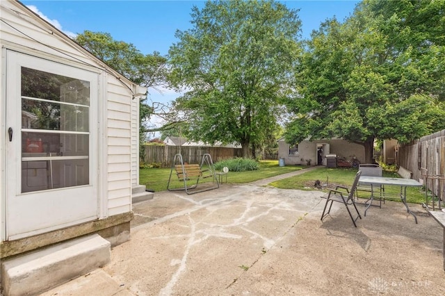 313 N High St, Wilmington, OH 45177 - fenced backyard featuring entry steps and a patio area