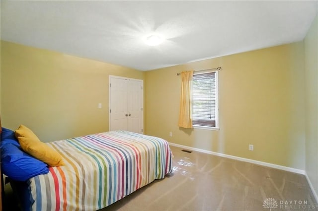 9113 Maple St, Huntsville, OH 43324 - bedroom featuring baseboards and carpet flooring