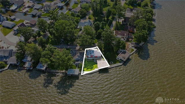 9113 Maple St, Huntsville, OH 43324 - aerial view of property's location with nearby suburban area, property boundaries highlighted, and a nearby body of water