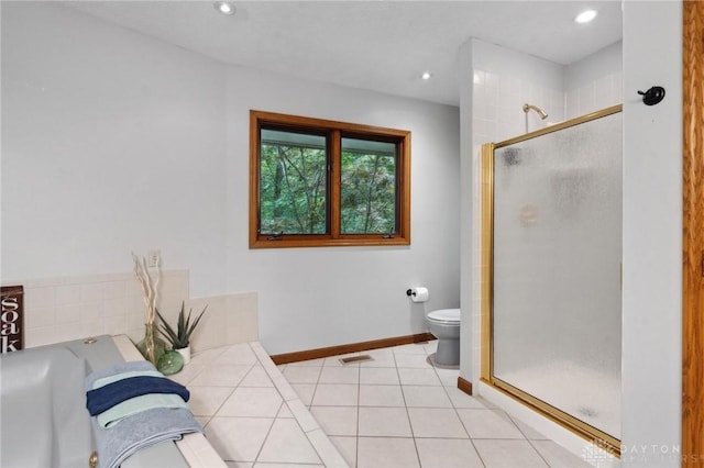 923 Lewis Creek Ct, Xenia, OH 45385 - bathroom with a shower stall, a garden tub, recessed lighting, and tile patterned flooring