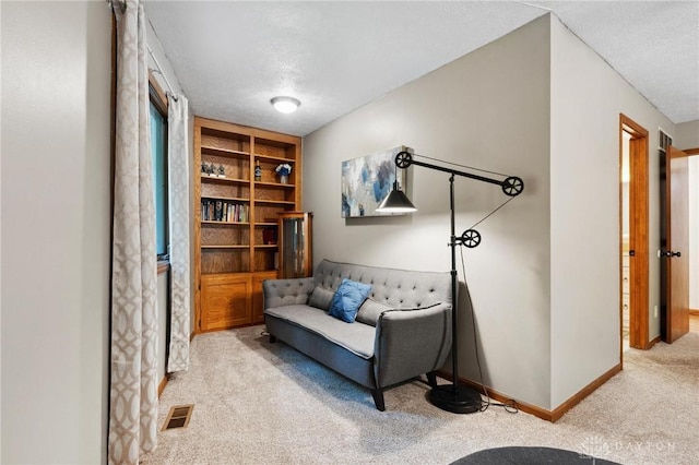 923 Lewis Creek Ct, Xenia, OH 45385 - sitting room featuring carpet flooring and a textured ceiling