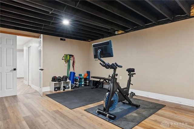 923 Lewis Creek Ct, Xenia, OH 45385 - workout area featuring wood finished floors and baseboards