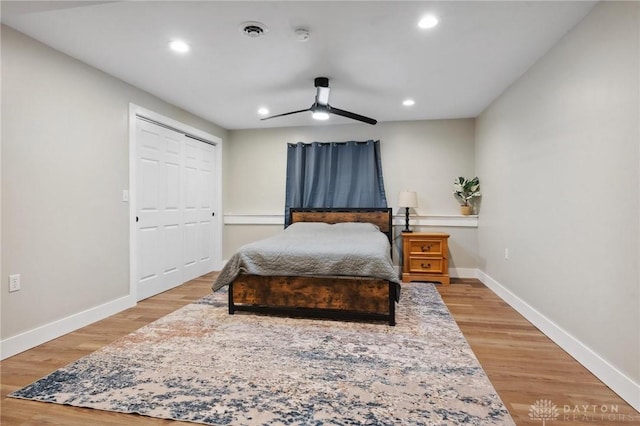 923 Lewis Creek Ct, Xenia, OH 45385 - bedroom with recessed lighting, light wood-style flooring, ceiling fan, and a closet