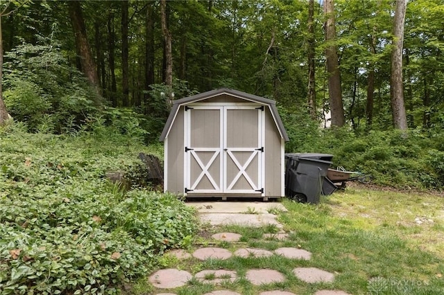 923 Lewis Creek Ct, Xenia, OH 45385 - view of shed with a forest view