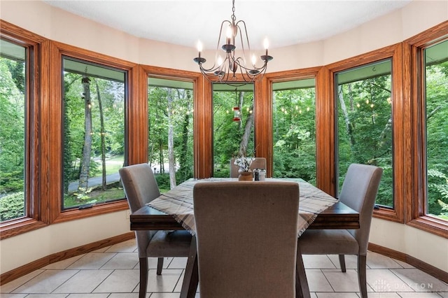 923 Lewis Creek Ct, Xenia, OH 45385 - dining space with a chandelier and light tile patterned flooring