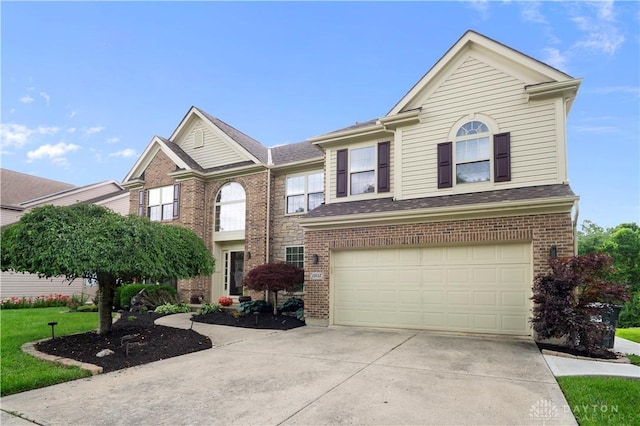 12052 Doe Run Ct, Springfield Twp, OH 45240 - traditional-style home featuring driveway, brick siding, and a garage
