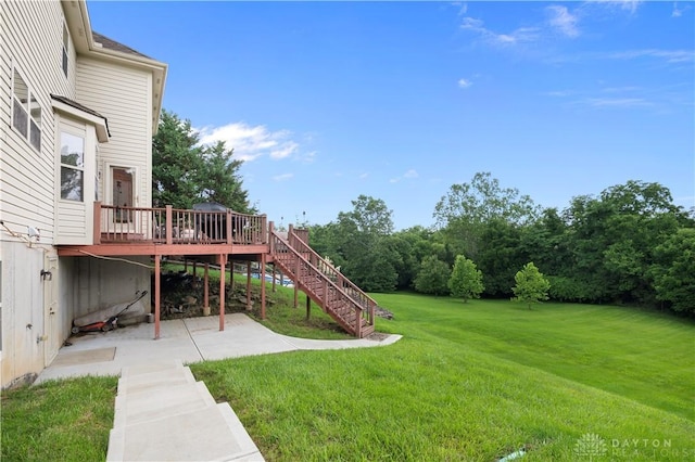 12052 Doe Run Ct, Springfield Twp, OH 45240 - view of grassy yard with a wooden deck, a patio area, and stairway