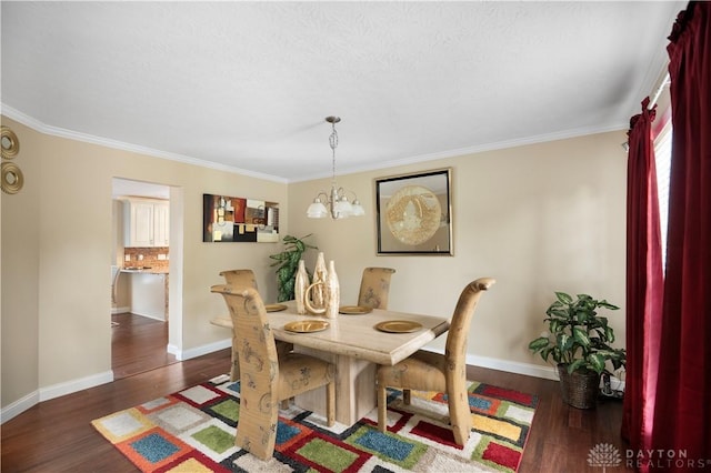 12052 Doe Run Ct, Springfield Twp, OH 45240 - dining room featuring wood finished floors, a chandelier, and crown molding