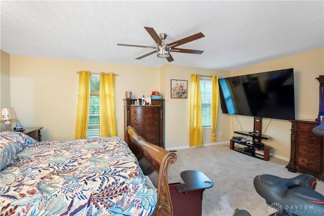 12052 Doe Run Ct, Springfield Twp, OH 45240 - bedroom featuring carpet floors, a textured ceiling, and ceiling fan
