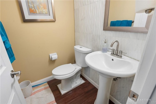 12052 Doe Run Ct, Springfield Twp, OH 45240 - half bathroom featuring wood finished floors, tasteful backsplash, and tile walls