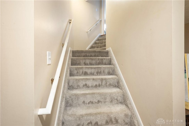 12052 Doe Run Ct, Springfield Twp, OH 45240 - stairs featuring baseboards