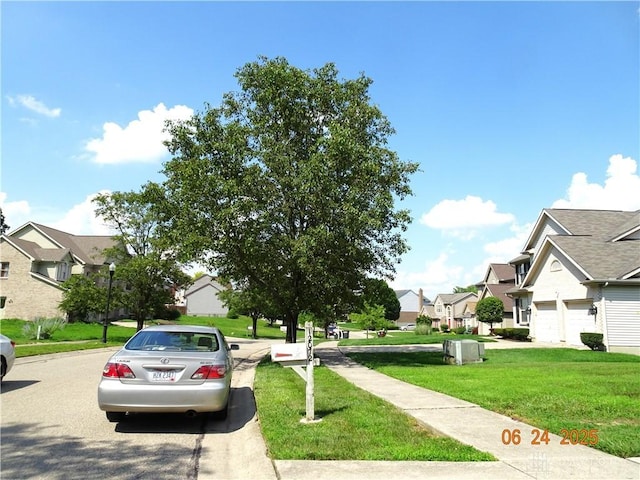 12052 Doe Run Ct, Springfield Twp, OH 45240 - view of asphalt street featuring a residential view, sidewalks, street lighting, and curbs