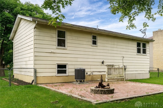 113 Marrett Farm Rd, Englewood, OH 45322 - back of property featuring a patio and an outdoor fire pit