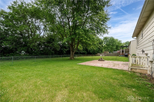 113 Marrett Farm Rd, Englewood, OH 45322 - fenced backyard with a patio and view of wooded area