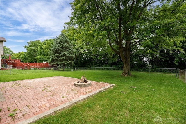 113 Marrett Farm Rd, Englewood, OH 45322 - fenced backyard featuring a patio area and an outdoor fire pit