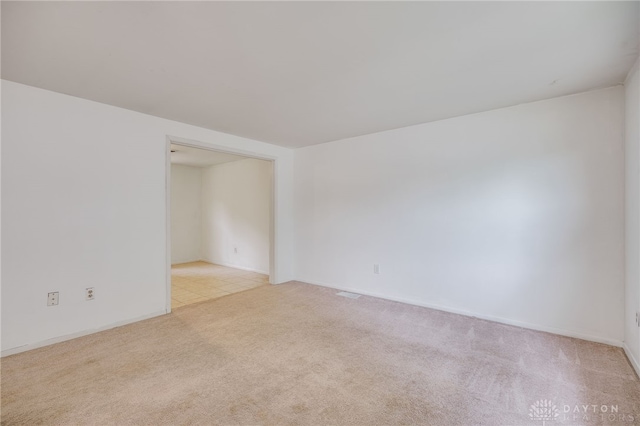 113 Marrett Farm Rd, Englewood, OH 45322 - unfurnished room with light carpet and baseboards