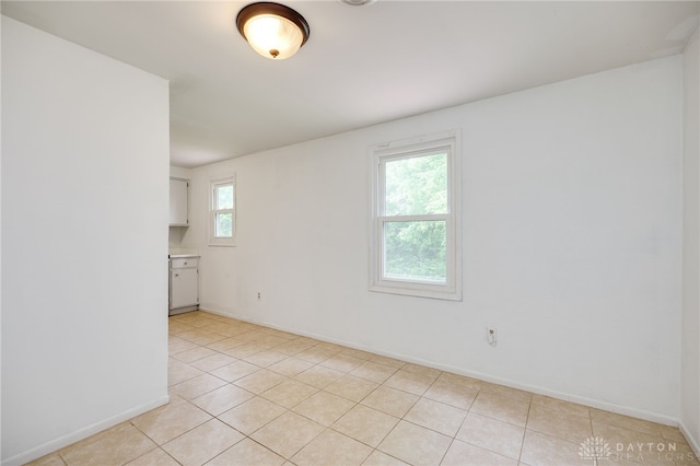 113 Marrett Farm Rd, Englewood, OH 45322 - spare room featuring light tile patterned flooring and baseboards