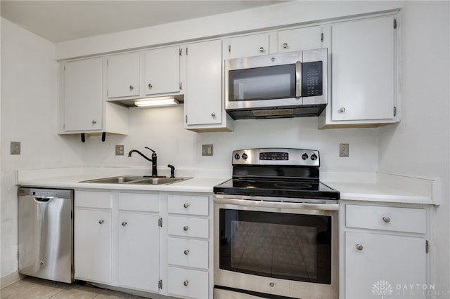 113 Marrett Farm Rd, Englewood, OH 45322 - kitchen featuring appliances with stainless steel finishes, light countertops, and white cabinetry
