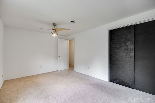 113 Marrett Farm Rd, Englewood, OH 45322 - unfurnished bedroom with light carpet, a closet, and ceiling fan