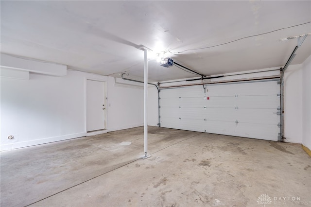 113 Marrett Farm Rd, Englewood, OH 45322 - garage featuring a garage door opener