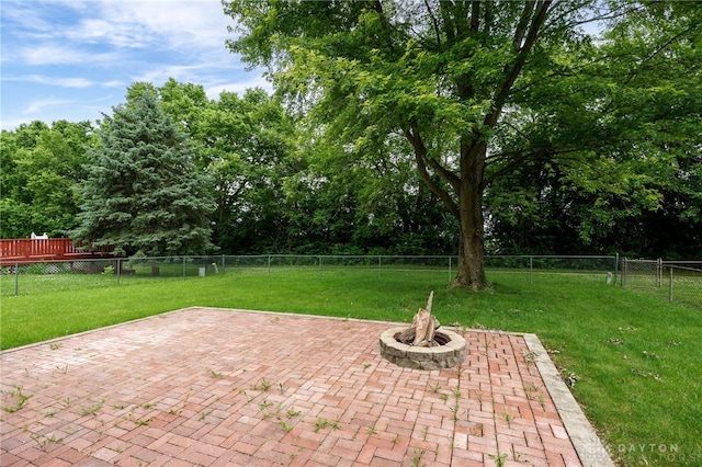 113 Marrett Farm Rd, Englewood, OH 45322 - fenced backyard featuring a patio and an outdoor fire pit