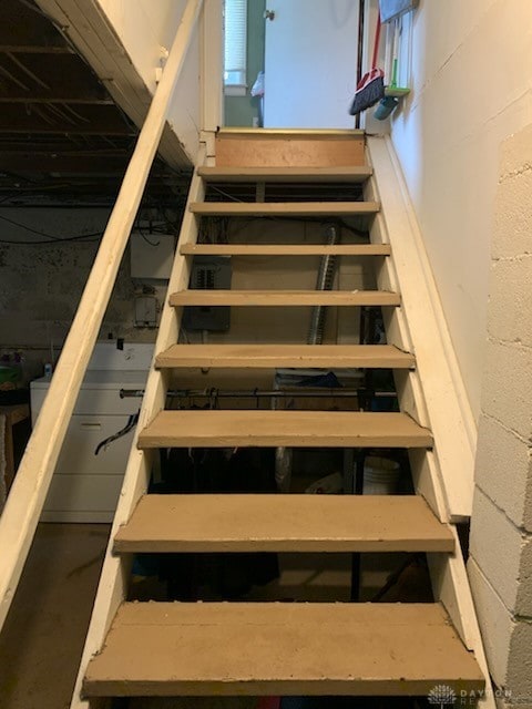 2222 Koebel Rd, Columbus, OH 43207 - staircase with concrete block wall