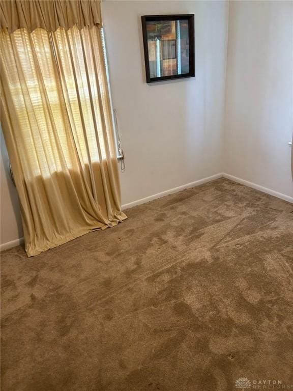 2222 Koebel Rd, Columbus, OH 43207 - carpeted spare room with baseboards