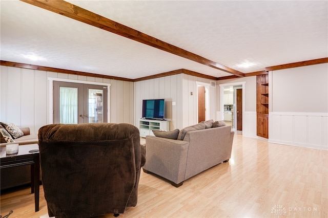 4675 Dearth Rd, Franklin Twp, OH 45005 - living area featuring a decorative wall, beamed ceiling, light wood-style flooring, french doors, and built in shelves