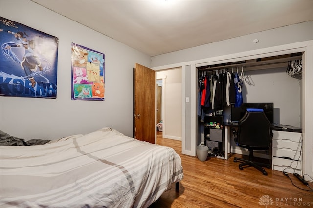 4675 Dearth Rd, Franklin Twp, OH 45005 - bedroom with wood finished floors and a closet