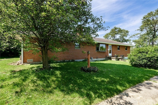 4675 Dearth Rd, Franklin Twp, OH 45005 - view of side of property with a yard and brick siding