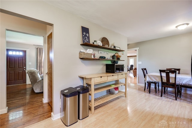 4675 Dearth Rd, Franklin Twp, OH 45005 - dining area with light wood-type flooring and baseboards