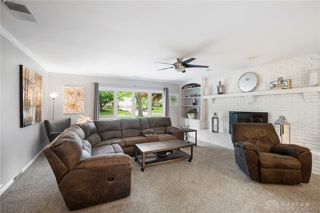 440 David Ln, Mason, OH 45040 - carpeted living area featuring a ceiling fan, crown molding, and a brick fireplace