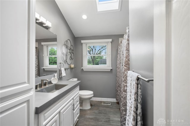 440 David Ln, Mason, OH 45040 - bathroom with vanity, lofted ceiling, wood finished floors, and recessed lighting