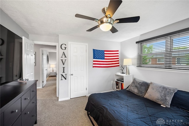 440 David Ln, Mason, OH 45040 - carpeted bedroom with a textured ceiling and ceiling fan