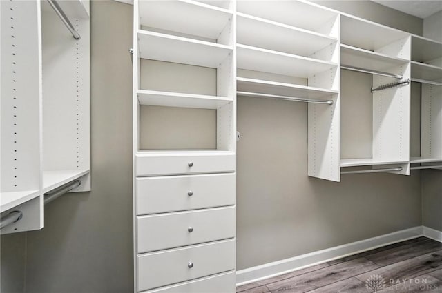 10101 Sawtry Ln, Washington Twp, OH 45458 - spacious closet with dark wood-style flooring