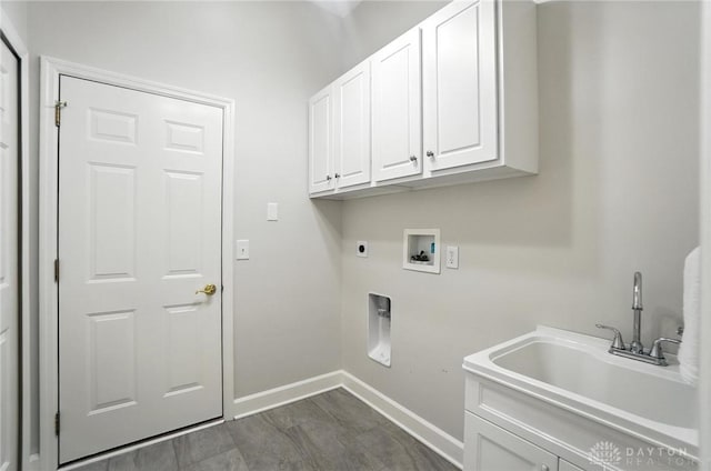 10101 Sawtry Ln, Washington Twp, OH 45458 - laundry room with cabinet space, electric dryer hookup, and hookup for a washing machine