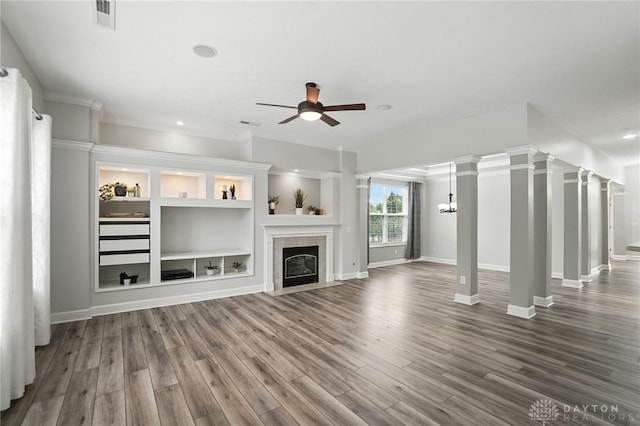 10101 Sawtry Ln, Washington Twp, OH 45458 - unfurnished living room featuring a ceiling fan, wood finished floors, a fireplace, ornamental molding, and recessed lighting