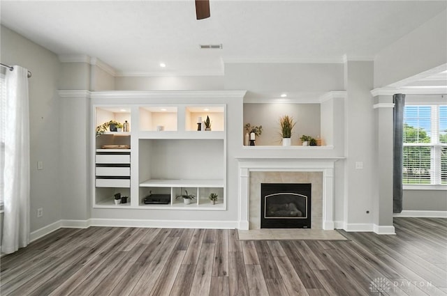 10101 Sawtry Ln, Washington Twp, OH 45458 - unfurnished living room with wood finished floors, a fireplace, ceiling fan, crown molding, and recessed lighting