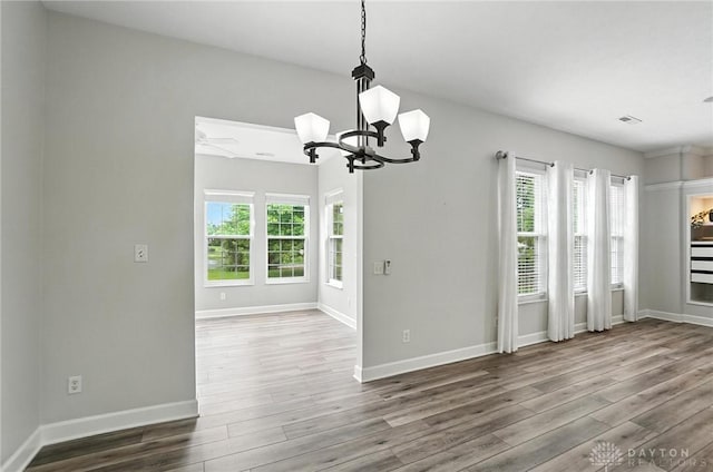 10101 Sawtry Ln, Washington Twp, OH 45458 - spare room with wood finished floors and a chandelier