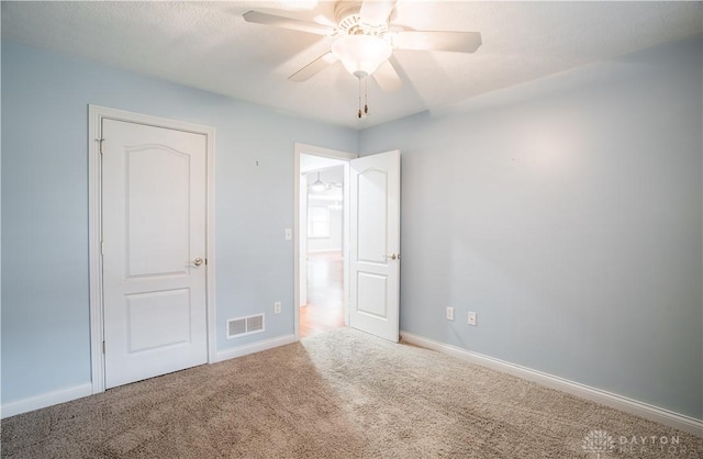 797 Waldsmith Way, Vandalia, OH 45377 - unfurnished bedroom with carpet and ceiling fan
