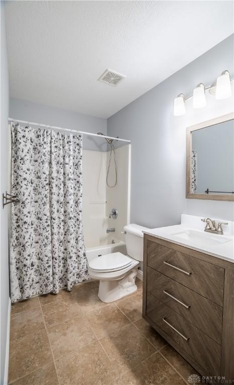 797 Waldsmith Way, Vandalia, OH 45377 - bathroom with vanity and shower / tub combo with curtain