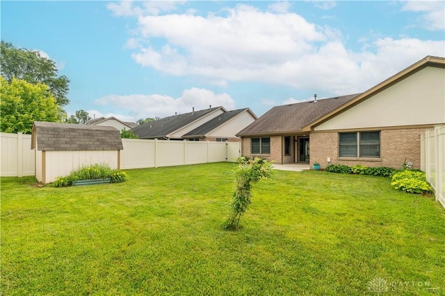 797 Waldsmith Way, Vandalia, OH 45377 - fenced backyard with a storage shed and a patio