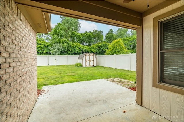 797 Waldsmith Way, Vandalia, OH 45377 - fenced backyard with a patio area, a ceiling fan, and a shed