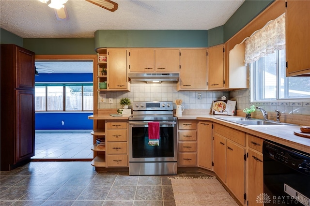 5587 Penn Ave, Riverside, OH 45432 - kitchen with electric stove, dishwasher, under cabinet range hood, open shelves, and light countertops