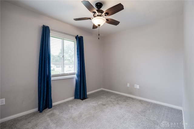 5587 Penn Ave, Riverside, OH 45432 - unfurnished room with light carpet and a ceiling fan