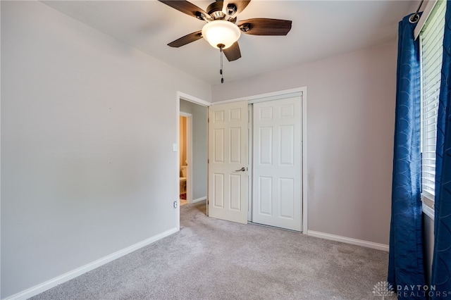 5587 Penn Ave, Riverside, OH 45432 - unfurnished bedroom featuring carpet floors, a closet, and a ceiling fan