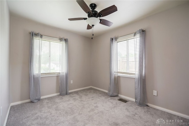5587 Penn Ave, Riverside, OH 45432 - empty room with carpet and a ceiling fan