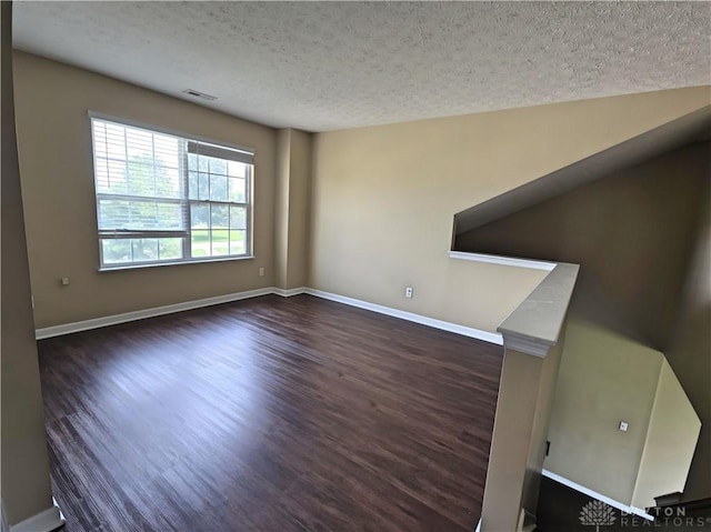 8736 Gingerwood Ct, Franklin, OH 45005 - unfurnished room featuring a textured ceiling and wood finished floors